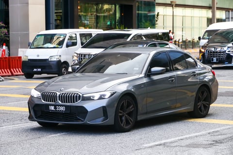 BMW 3 Series sedan in the city street