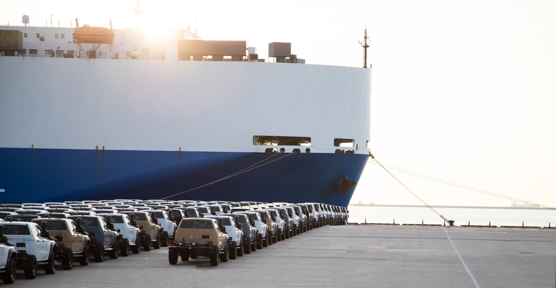 Vehicle carrier vessel loading cars for shipping